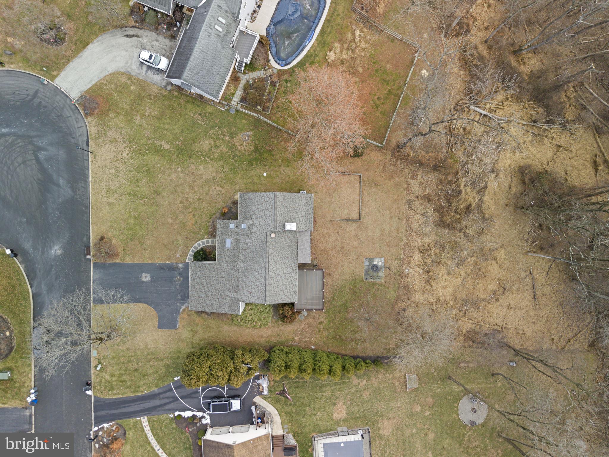 49 Langstoon Lane Media, PA 19063 - Photo 57 of 64 an aerial view of a house with a yard