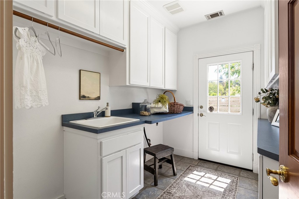897 Filbert Avenue Chico, CA 95926 - Photo 49 of 66 a kitchen with a sink cabinets and a window