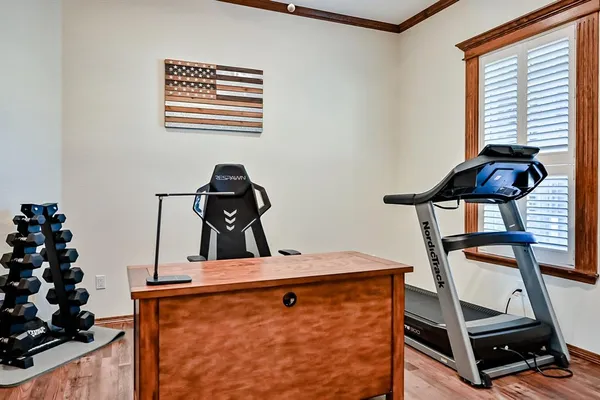 a view of a room with gym equipment