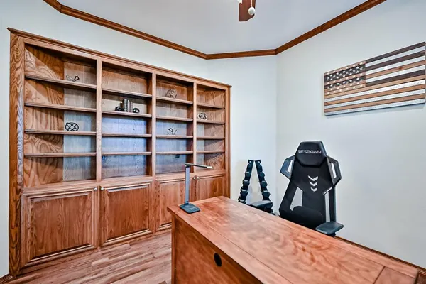 a view of a workspace with furniture