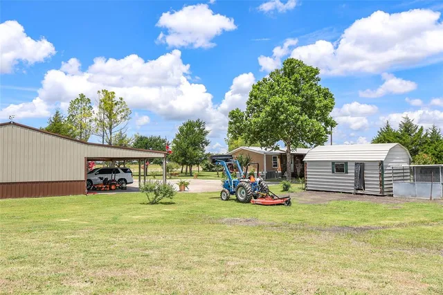 a kitchen with stainless steel appliances granite countertop a stove and a refrigerator