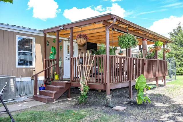 a view of a backyard with garden