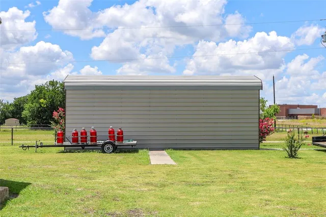 a house view with a garden space