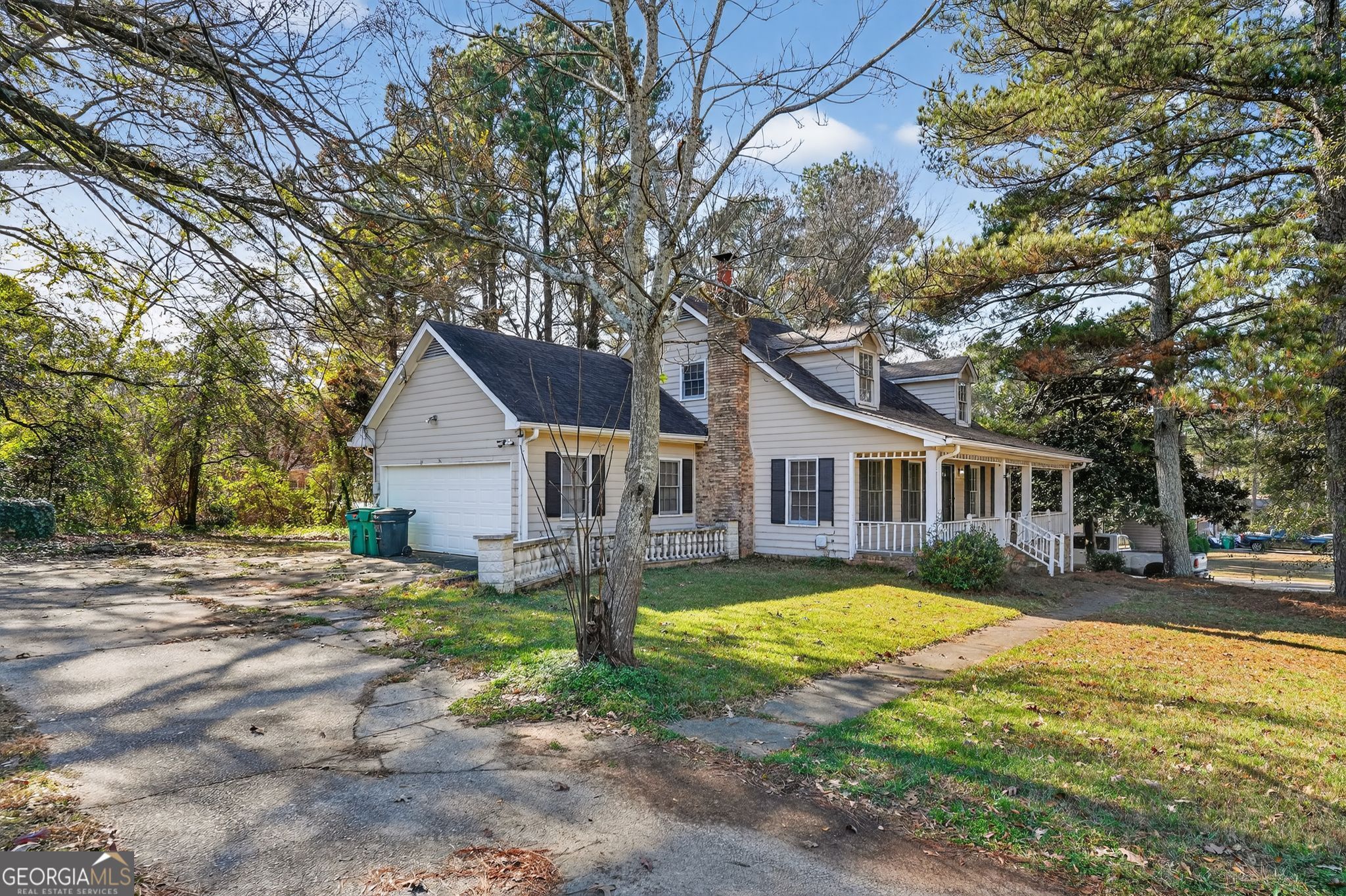 6581 Woodrow Road Lithonia, GA 30038 - Photo 2 of 34 a view of a house with a yard