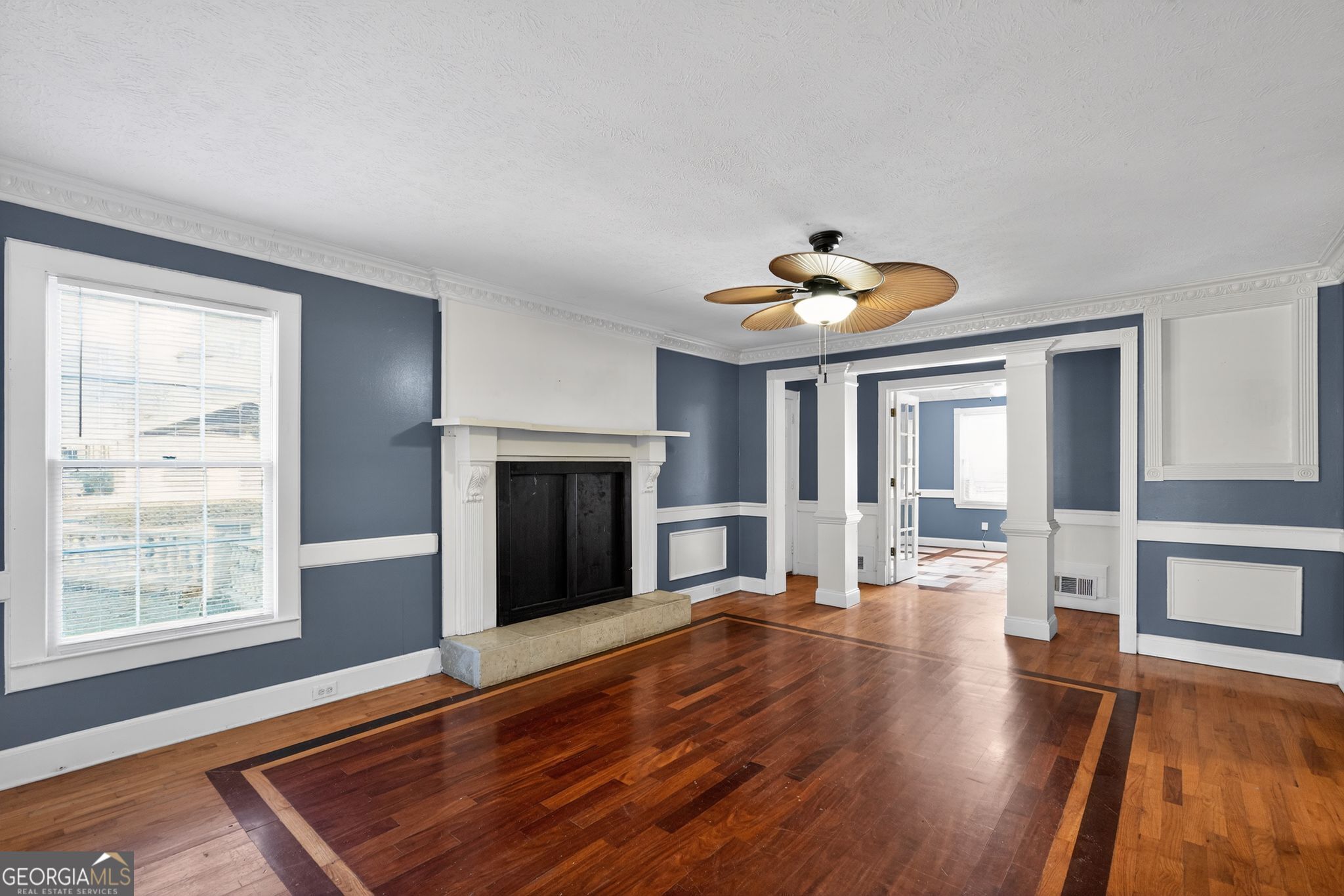 6581 Woodrow Road Lithonia, GA 30038 - Photo 4 of 34 a living room with furniture and a large window