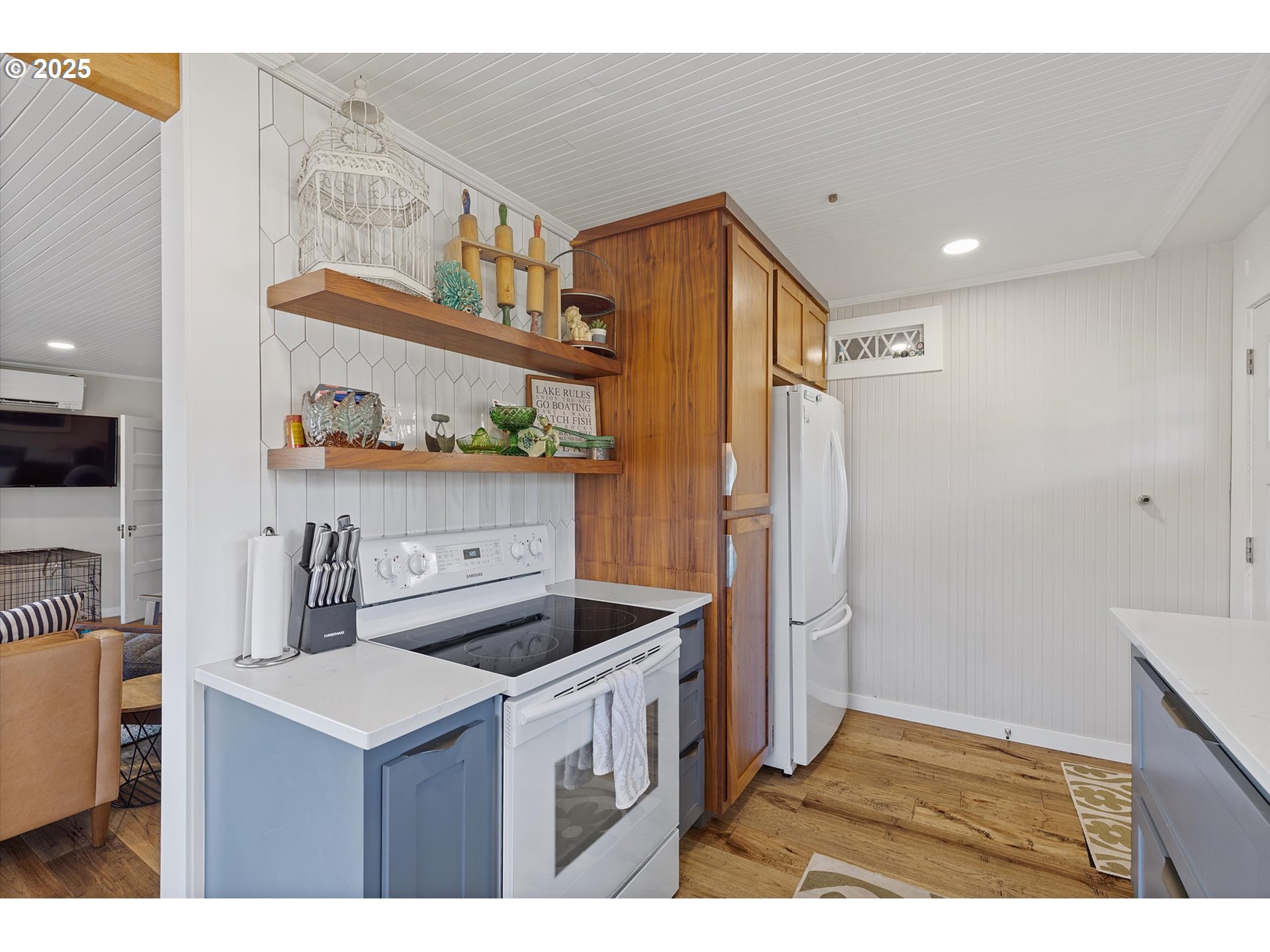 4692 Northeast I Avenue Neotsu, OR 97364 - Photo 14 of 41 a kitchen with stainless steel appliances granite countertop a refrigerator and a sink