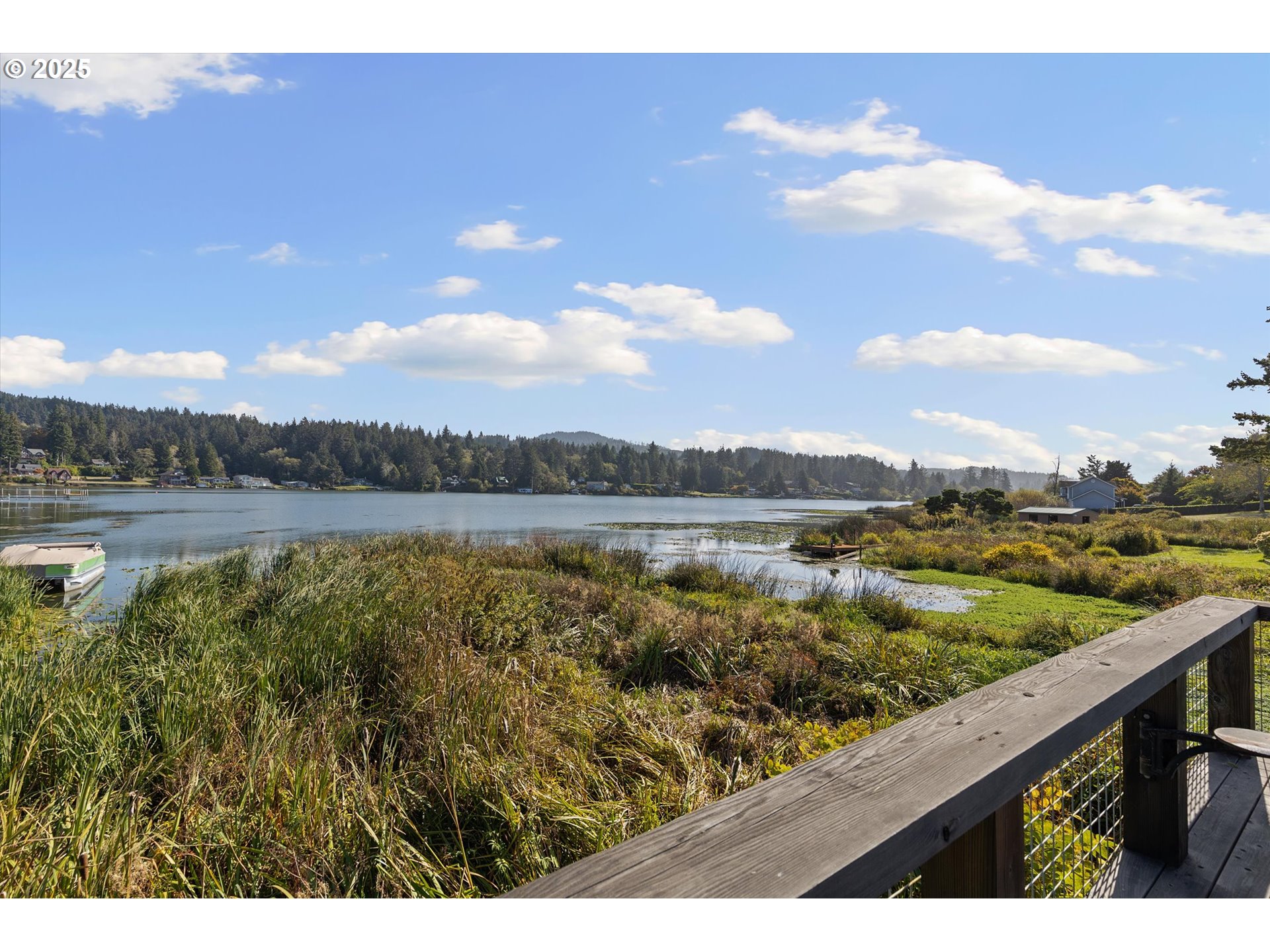 4692 Northeast I Avenue Neotsu, OR 97364 - Photo 27 of 41 a view of a lake with a city