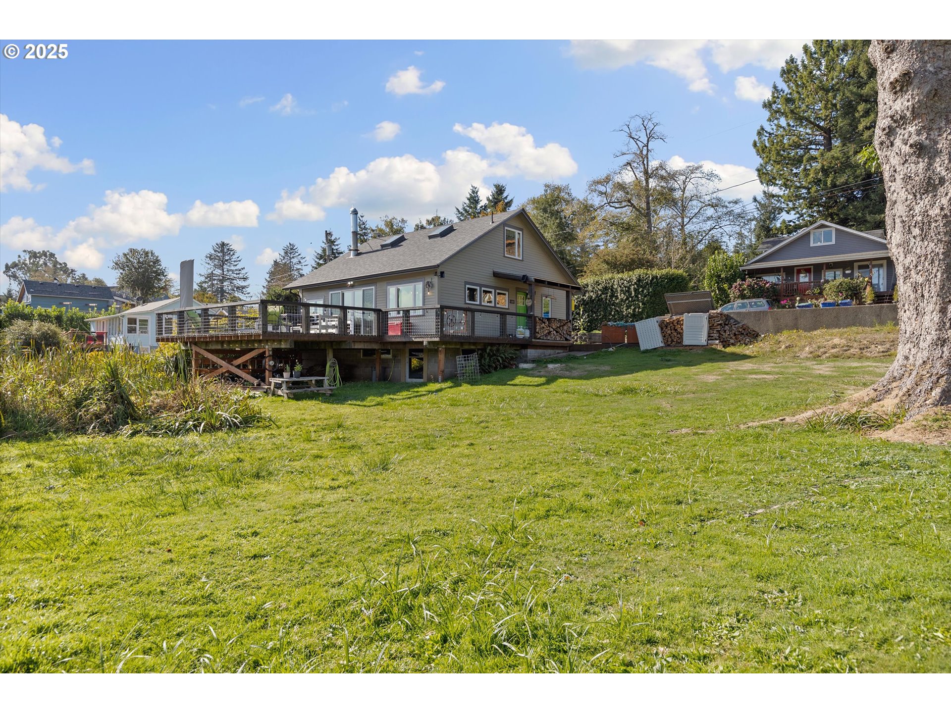 4692 Northeast I Avenue Neotsu, OR 97364 - Photo 30 of 41 a view of a house with a big yard