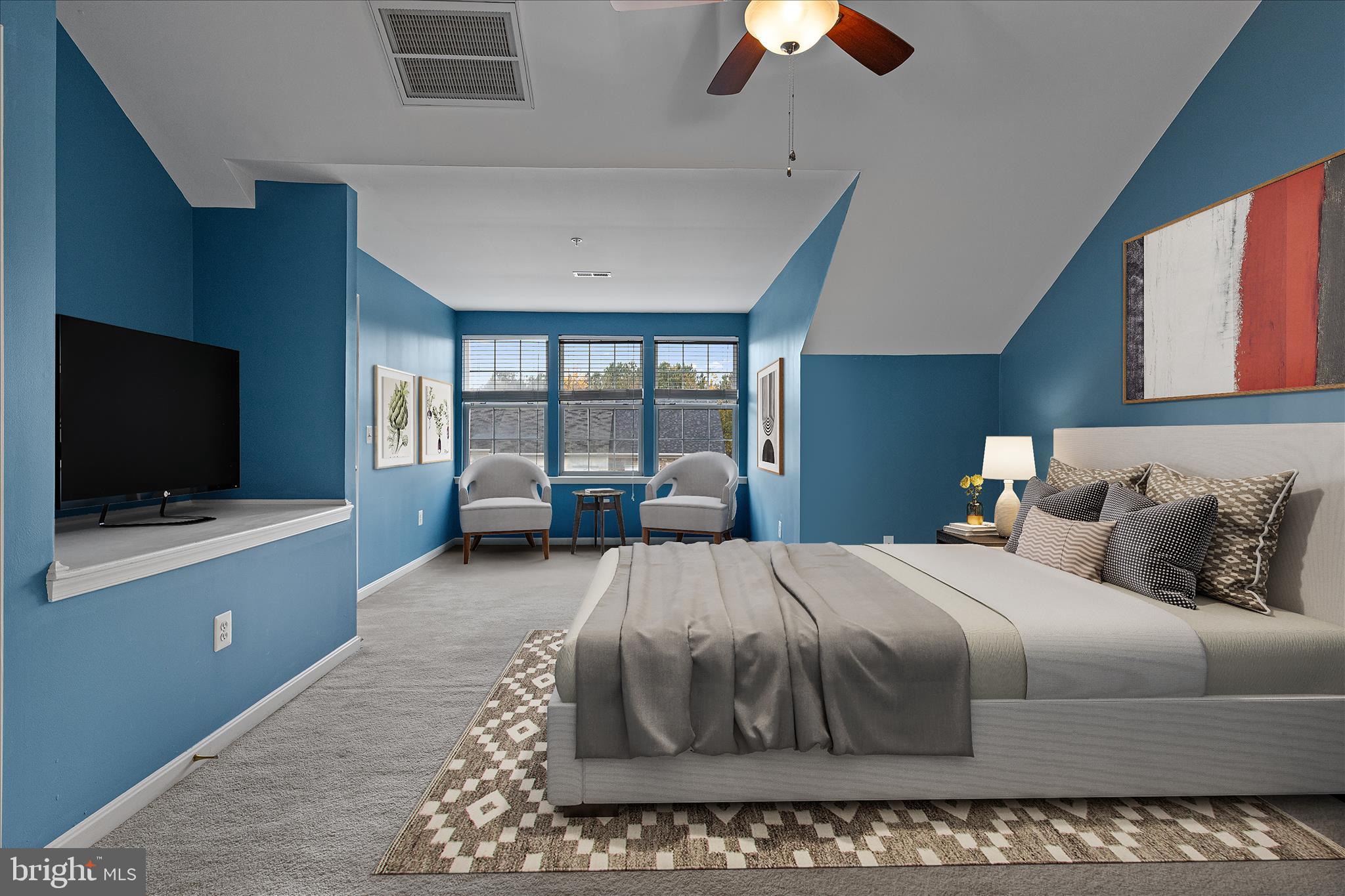 22742 Bayside Way California, MD 20619 - Photo 27 of 33 a bedroom with a large bed and a flat screen tv