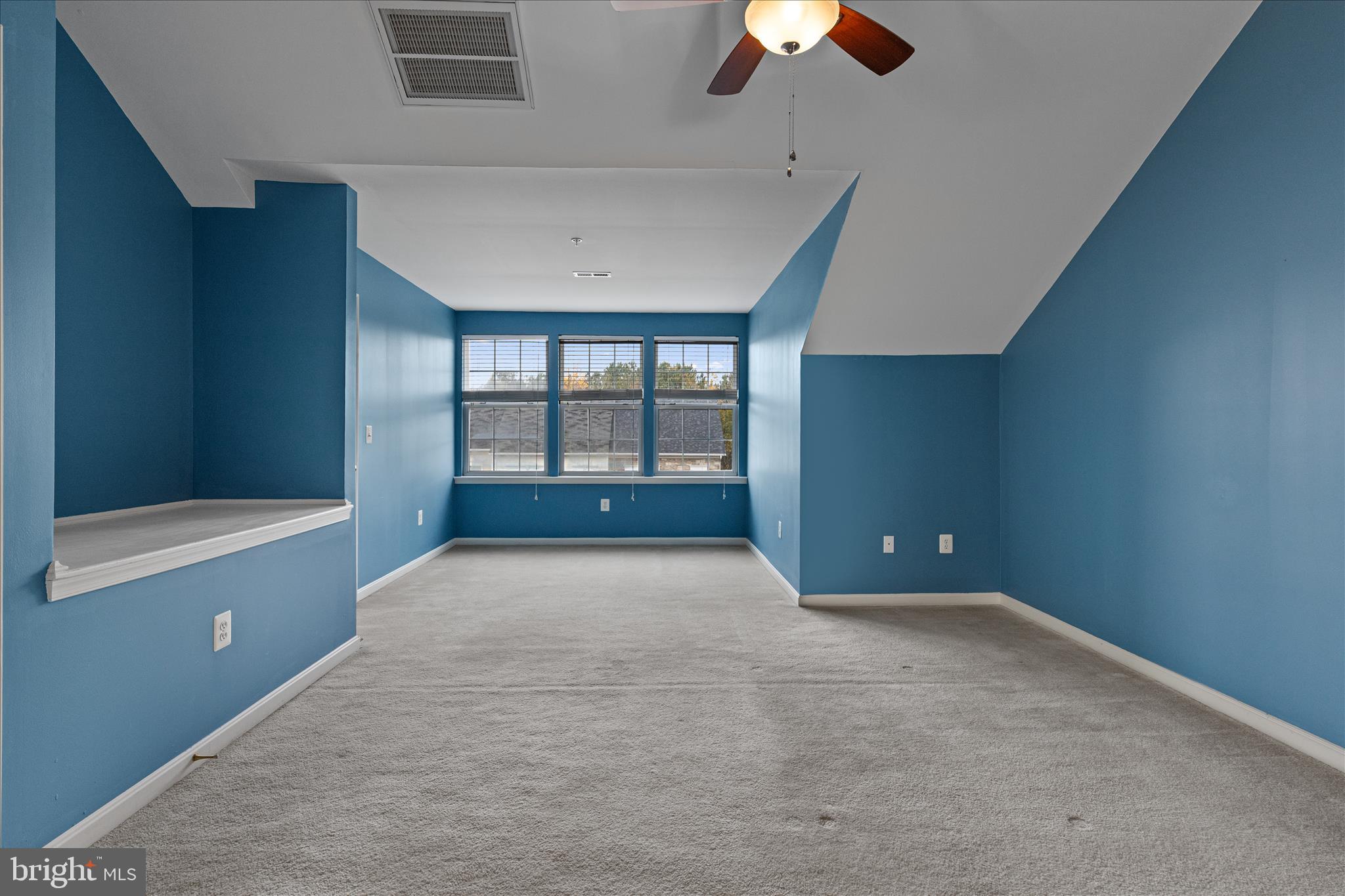 22742 Bayside Way California, MD 20619 - Photo 28 of 33 a view of an empty room with a window and a kitchen