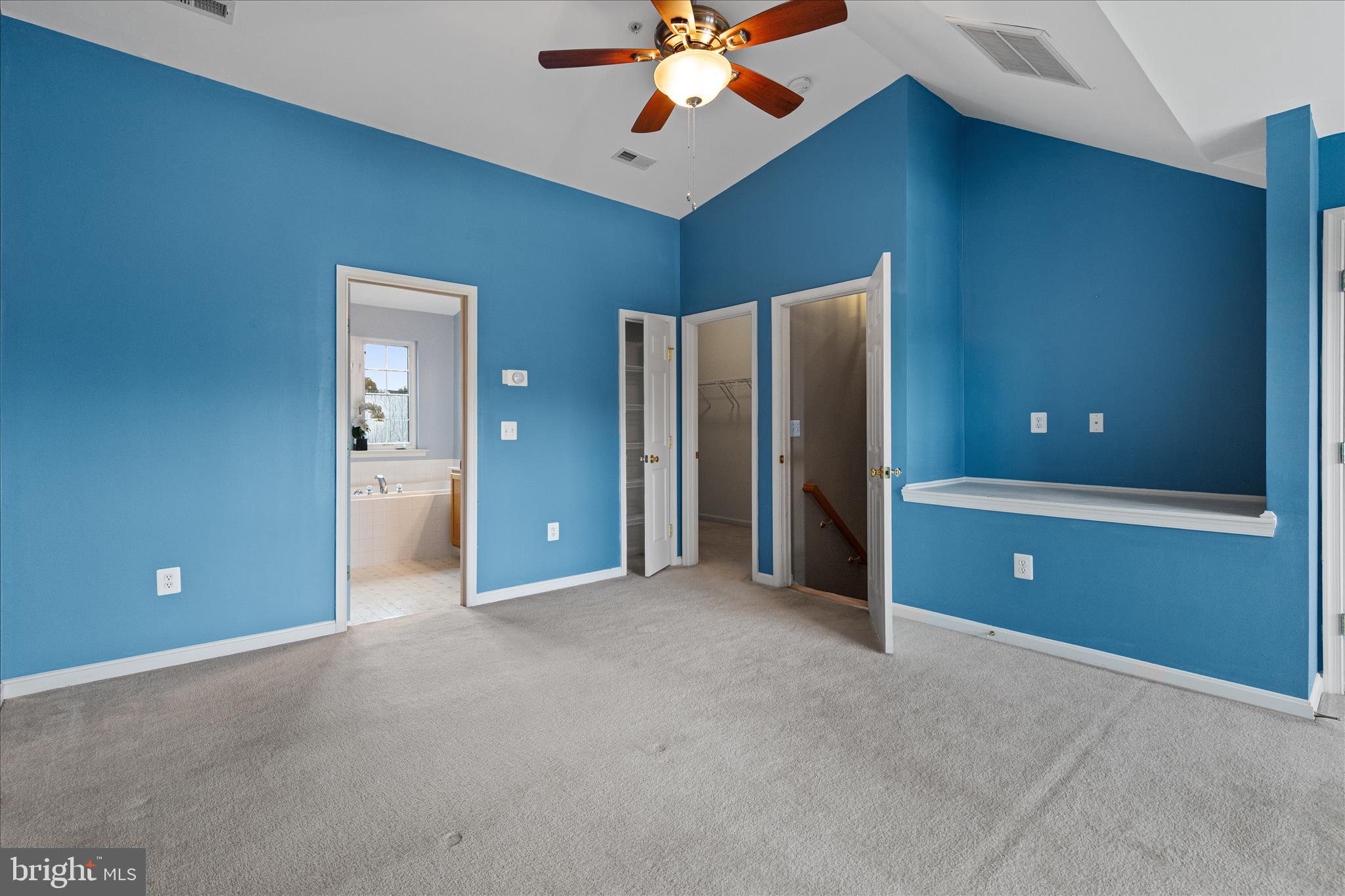 22742 Bayside Way California, MD 20619 - Photo 29 of 33 a view of a room with a chandelier fan and windows