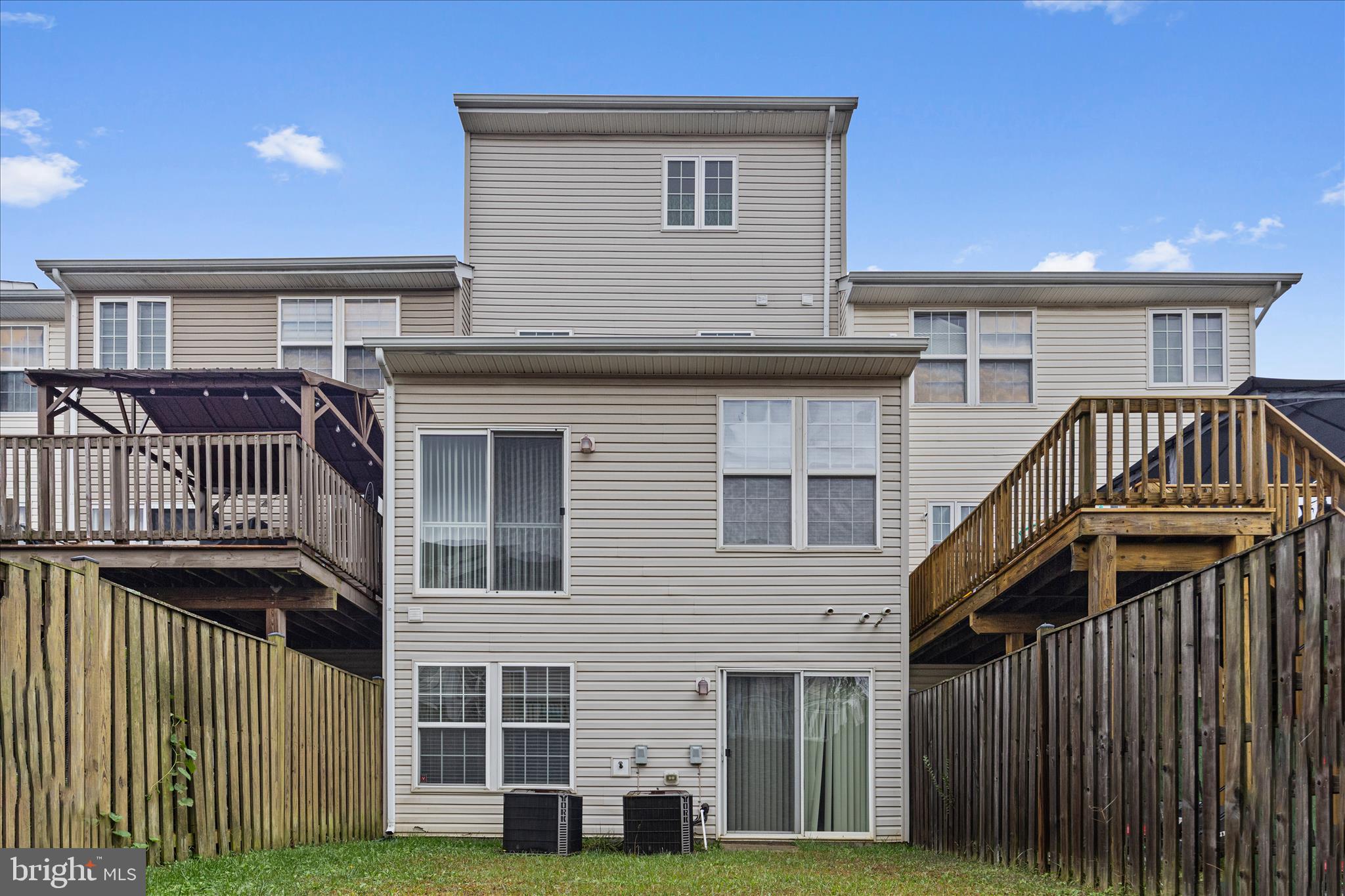 22742 Bayside Way California, MD 20619 - Photo 33 of 33 a view of a house with wooden deck
