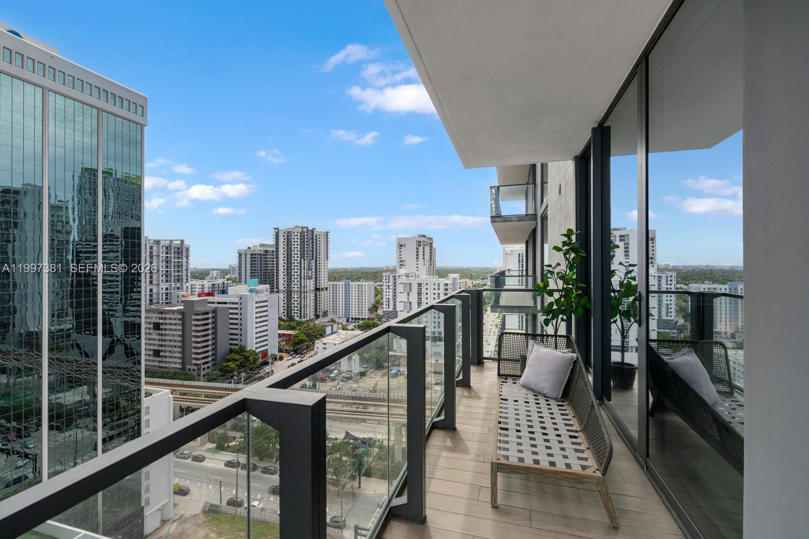 88 Southwest 7th Street, Unit 1401 Miami, FL 33130 - Photo 27 of 27 a view of balcony with furniture