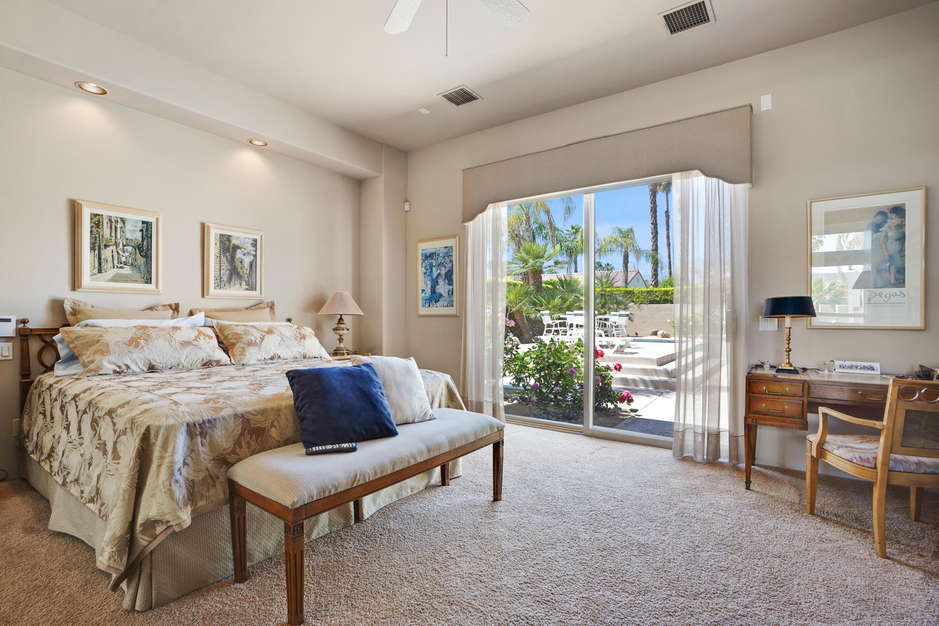 3 Silver Circle Rancho Mirage, CA 92270 - Photo 15 of 34 a bed room with a bed and a chair