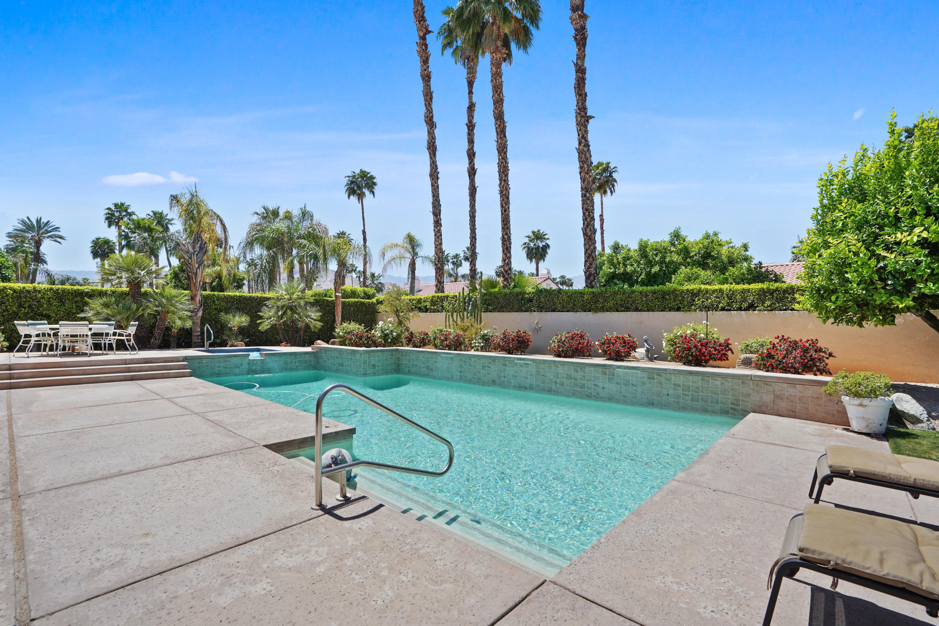 3 Silver Circle Rancho Mirage, CA 92270 - Photo 25 of 34 a park view with a bench and trees
