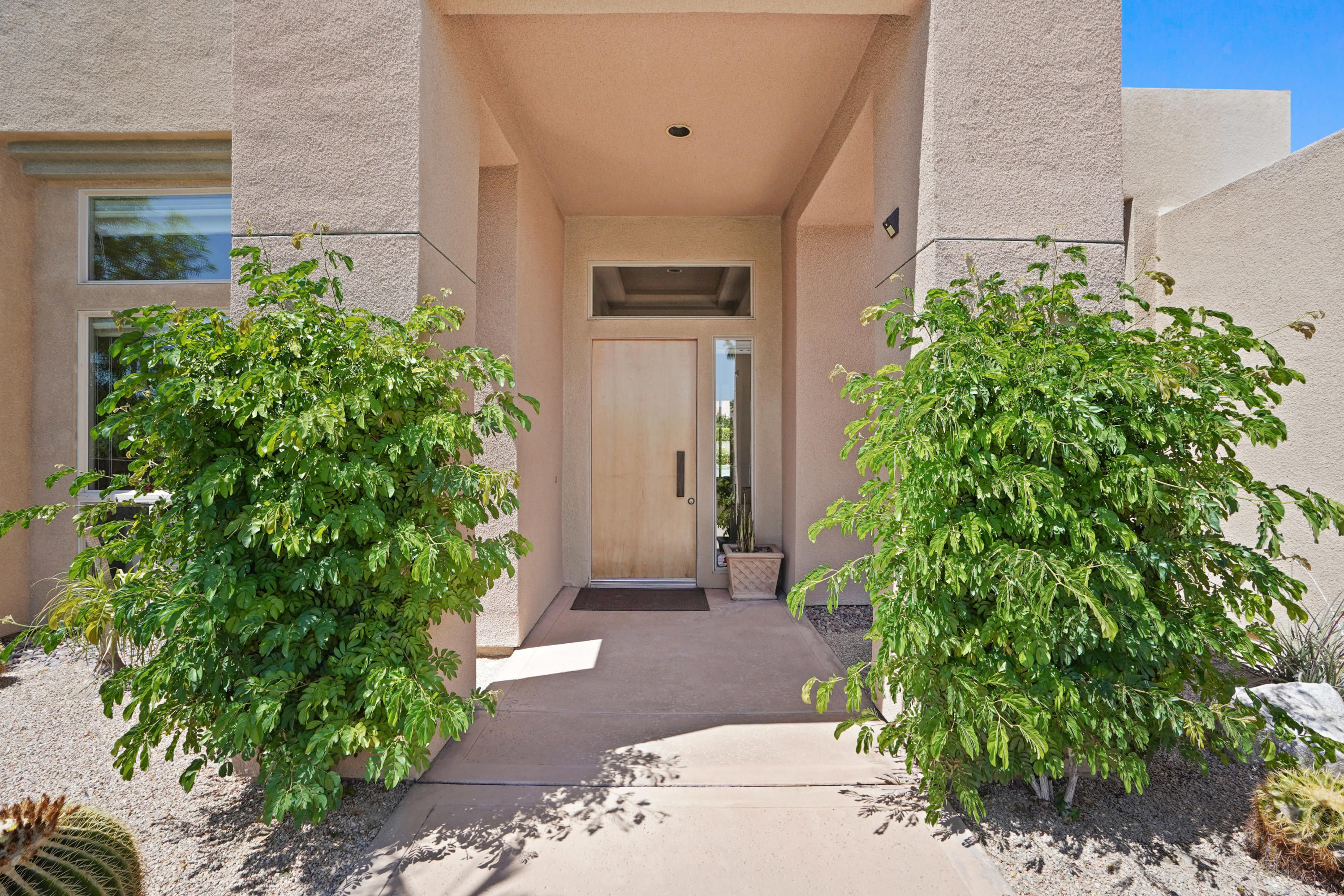 3 Silver Circle Rancho Mirage, CA 92270 - Photo 5 of 34 a front view of a house with garden