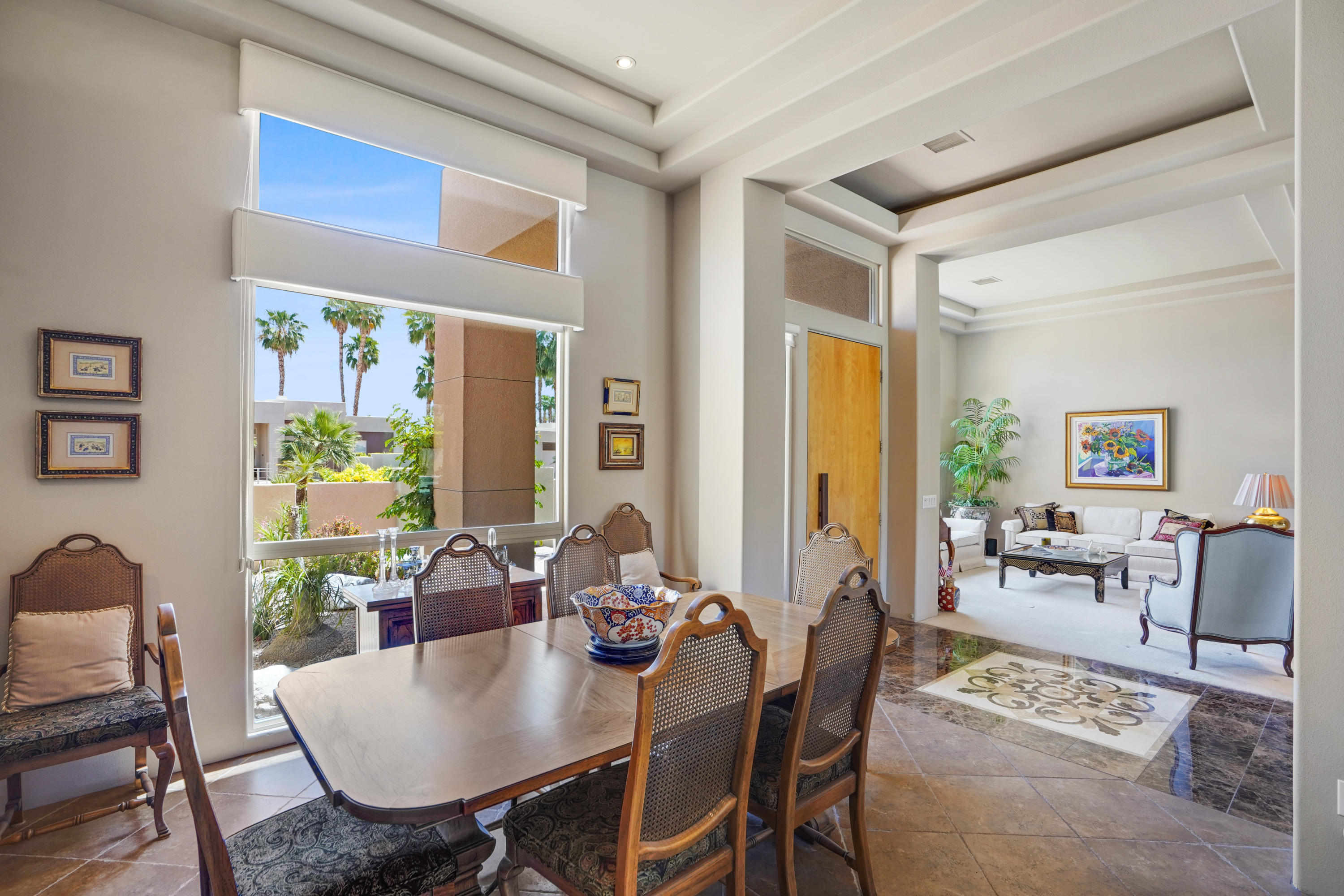 3 Silver Circle Rancho Mirage, CA 92270 - Photo 9 of 34 a view of a dining room with furniture window and outside view