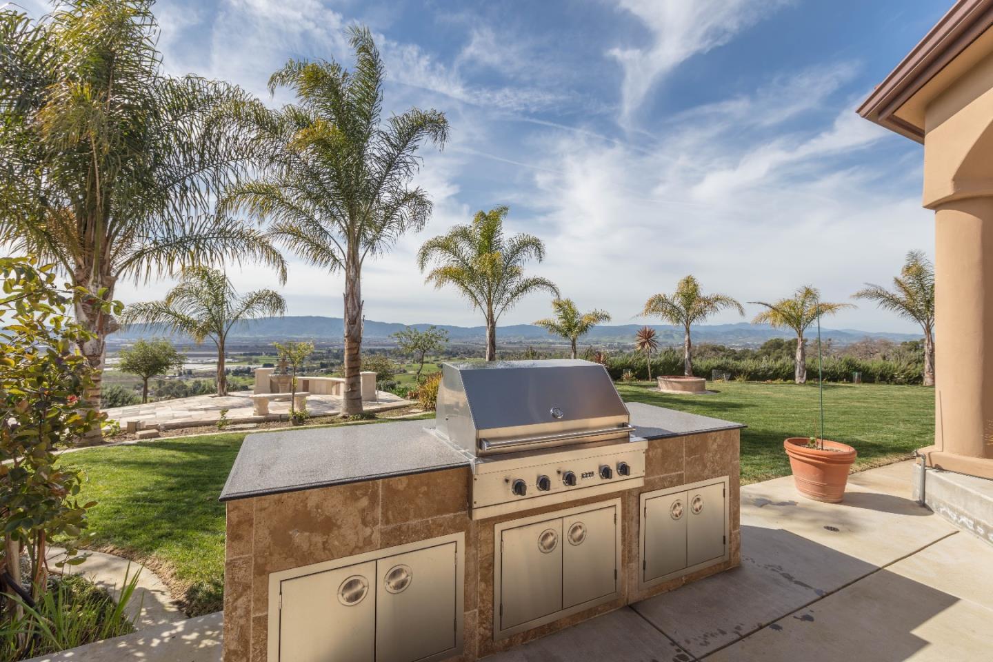 8715 Leavesley Road Gilroy, CA 95020 - Photo 50 of 50 a terrace of a house with outdoor seating
