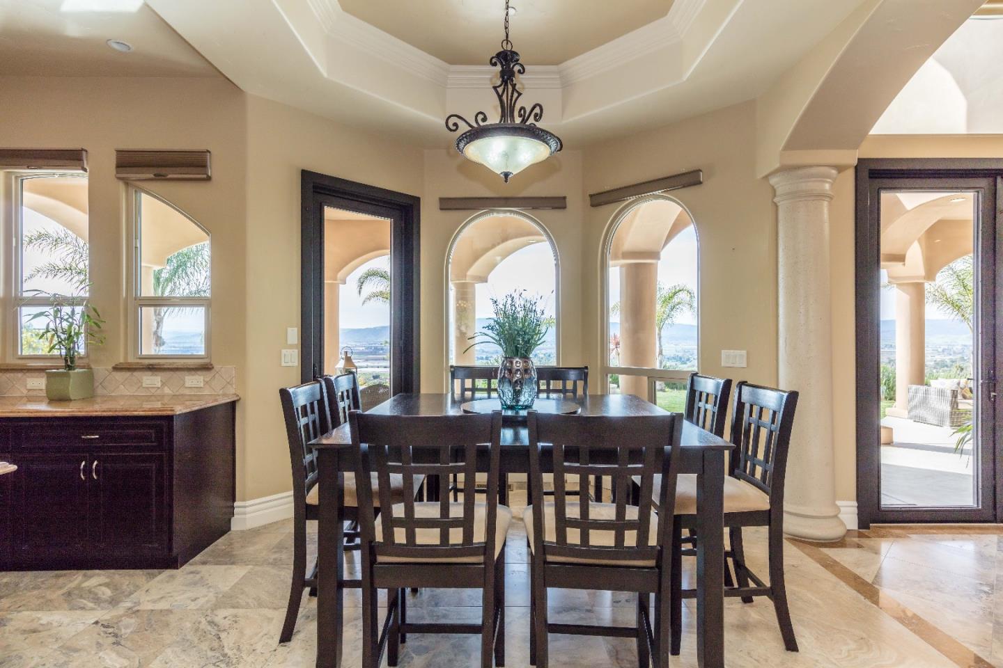 8715 Leavesley Road Gilroy, CA 95020 - Photo 9 of 50 a view of a dining room with furniture window and wooden floor