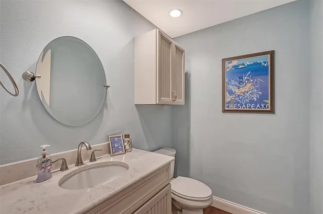 a view of a couches in patio with a yard