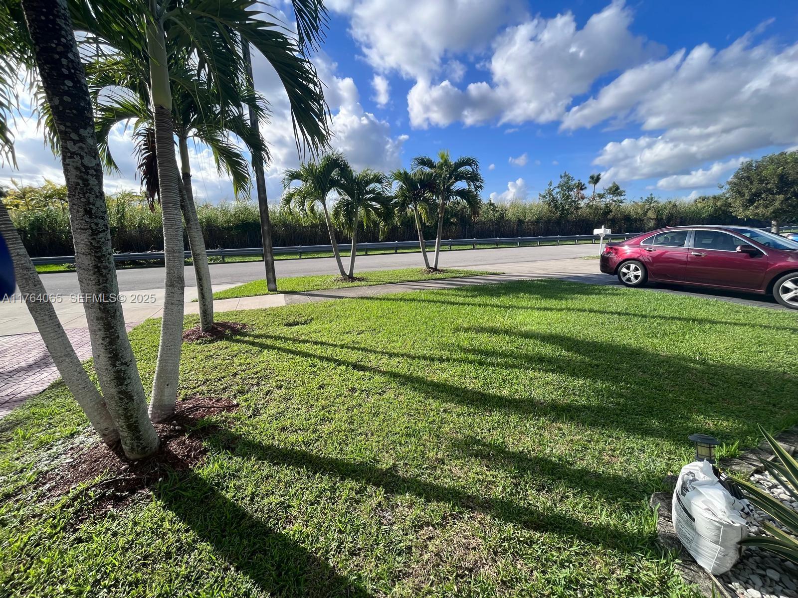 22937 Southwest 9th Avenue, Unit 1 Miami, FL 33170 - Photo 19 of 19 a view of a park with swings and slides