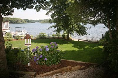 429 Lakeside Drive West Centerville, MA 02632 - Photo 16 of 21 a large body of water with a tree in the background