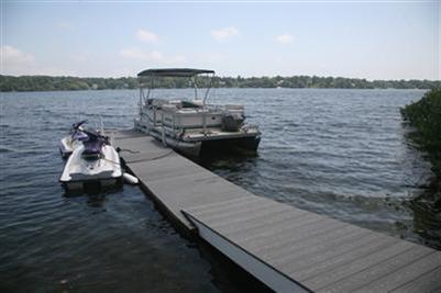429 Lakeside Drive West Centerville, MA 02632 - Photo 2 of 21 a view of a lake with a terrace
