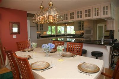 429 Lakeside Drive West Centerville, MA 02632 - Photo 6 of 21 a kitchen with a table and chairs in it