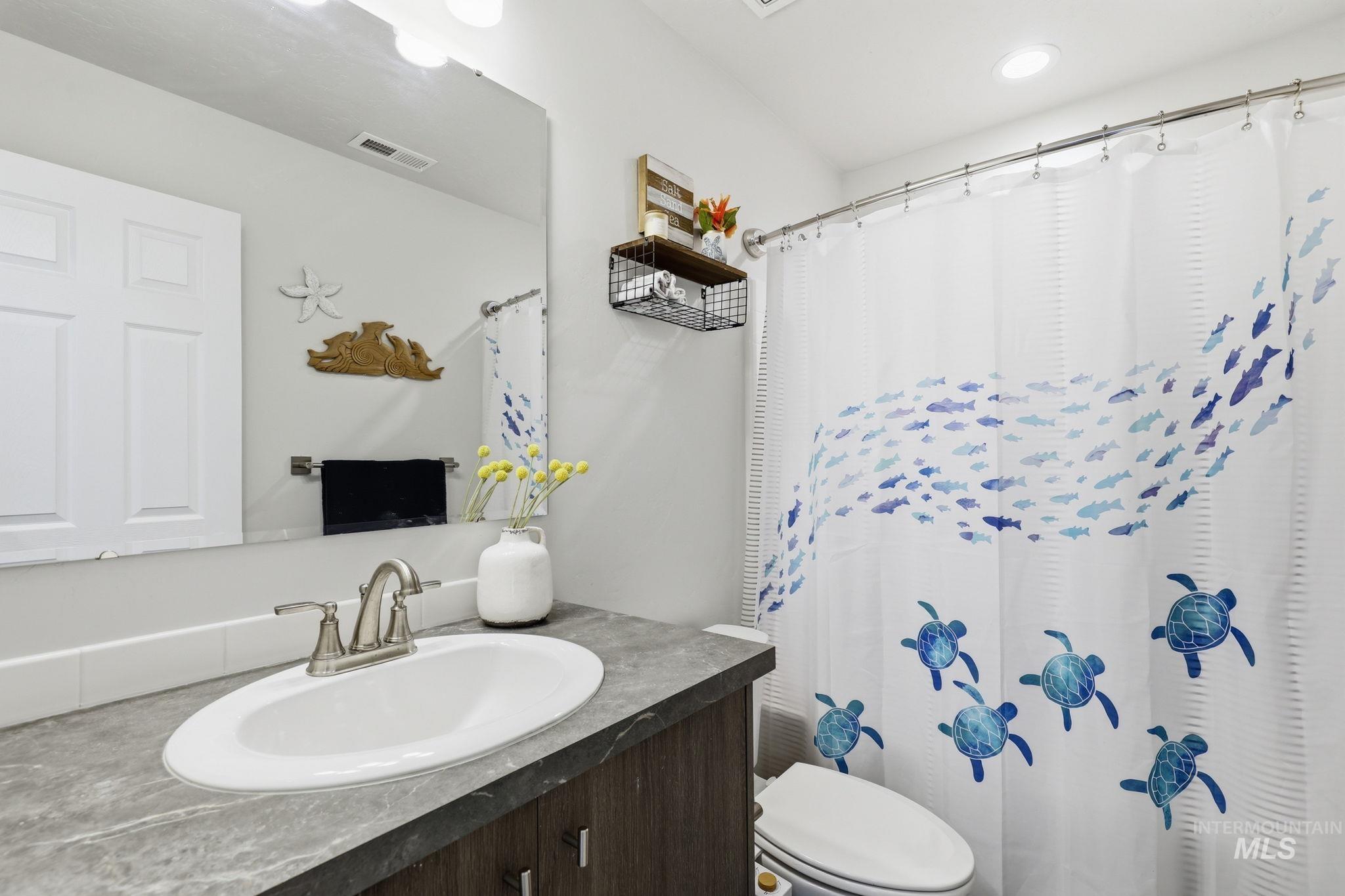 16780 Breton Way Caldwell, ID 83607 - Photo 5 of 28 Carpeted room featuring a double bifold closet, a single window with blinds, and white trim throughout