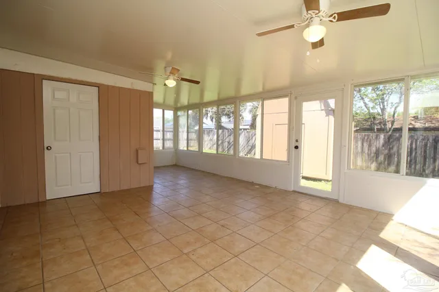 a view of an empty room and window