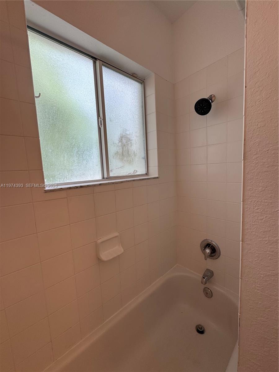 8500 Southwest 150th Avenue, Unit 3 Miami, FL 33193 - Photo 13 of 22 a bathroom with a bathtub