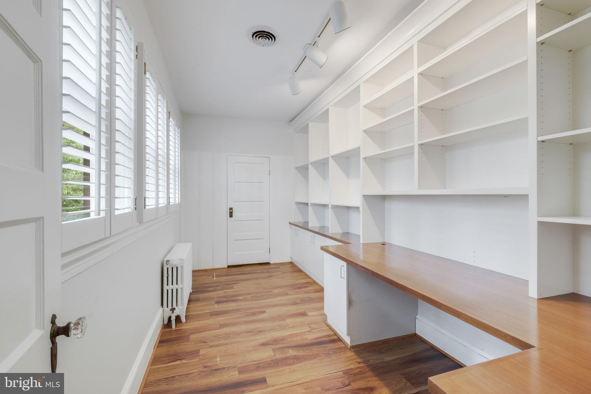 6220 Mazwood Road Rockville, MD 20852 - Photo 20 of 47 a hallway with cabinets