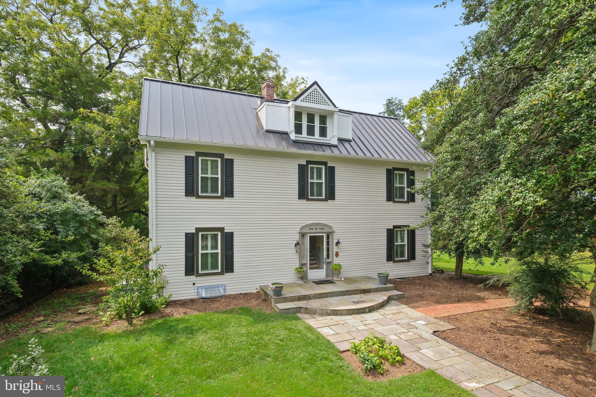 6220 Mazwood Road Rockville, MD 20852 - Photo 2 of 47 a front view of a house with a yard