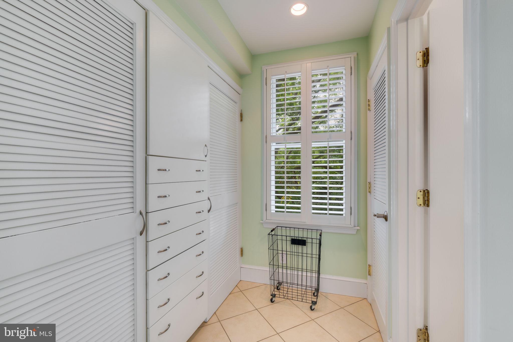 6220 Mazwood Road Rockville, MD 20852 - Photo 23 of 47 a view of a bedroom with windows