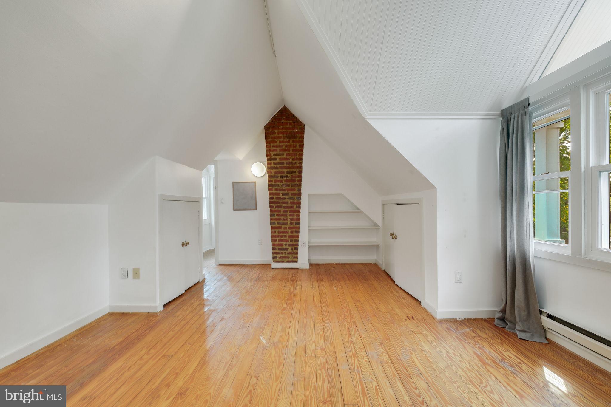 6220 Mazwood Road Rockville, MD 20852 - Photo 30 of 47 a view of empty room with wooden floor and fan