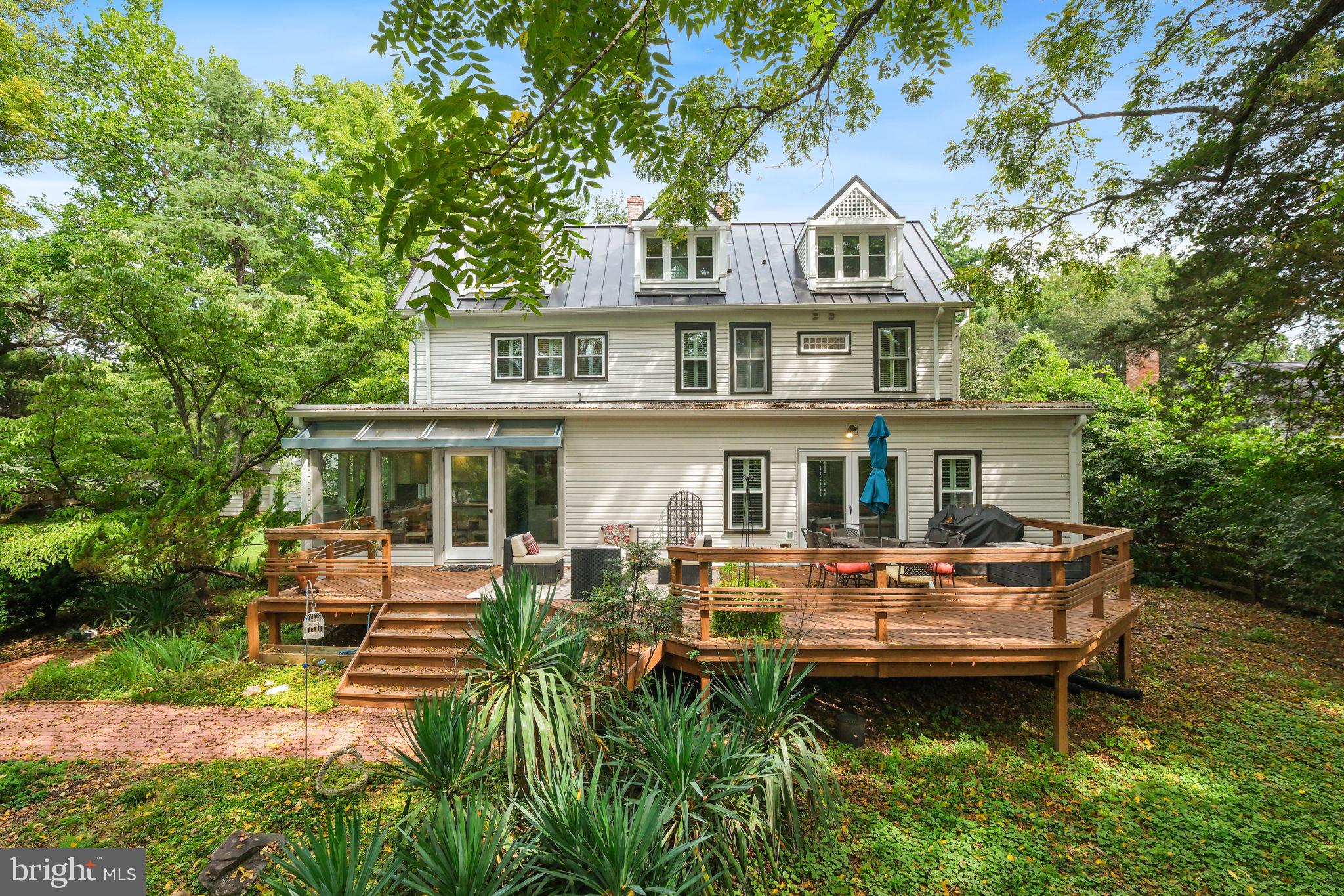 6220 Mazwood Road Rockville, MD 20852 - Photo 36 of 47 a front view of a house with swimming pool