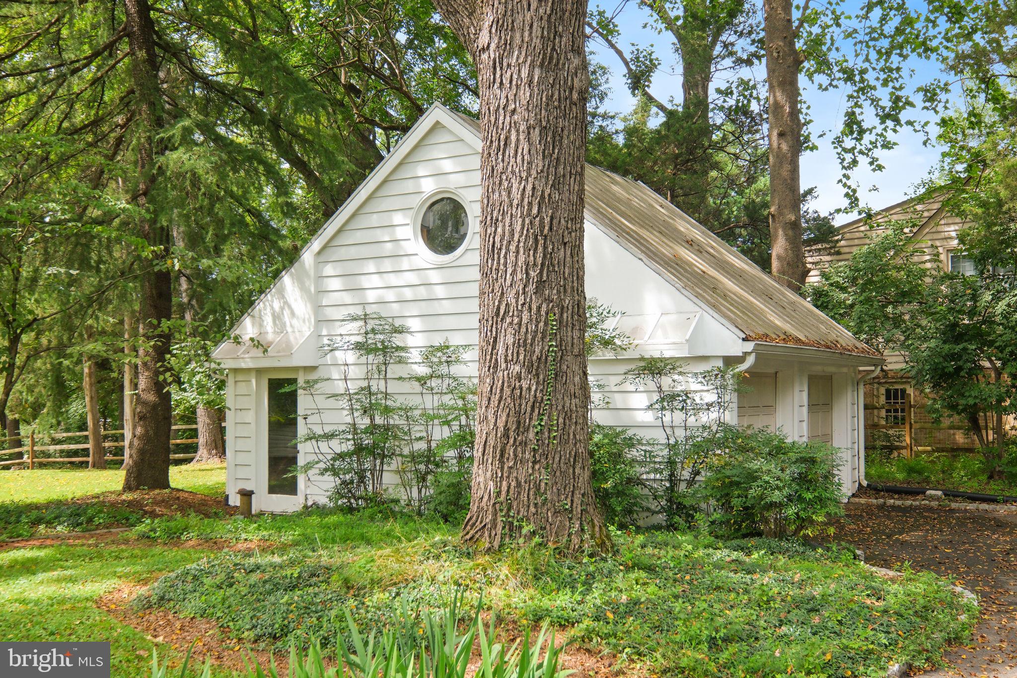 6220 Mazwood Road Rockville, MD 20852 - Photo 41 of 47 a view of a house with a yard