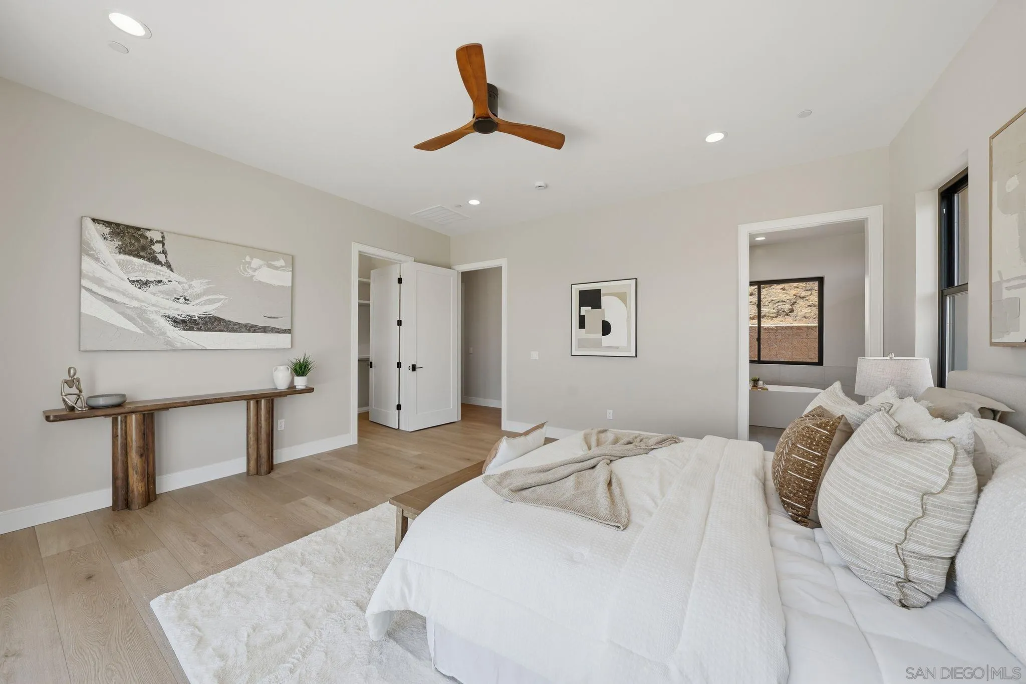 3916 Citrus Drive Fallbrook, CA 92028 - Photo 29 of 72 a bed room with a bed and a painting on the wall