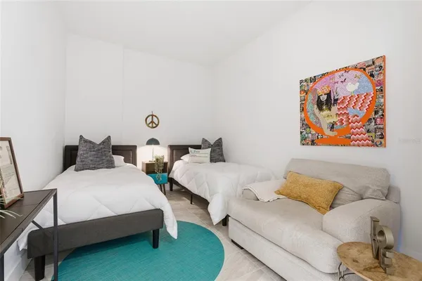 a large room with lots of wooden furniture and a view of living room