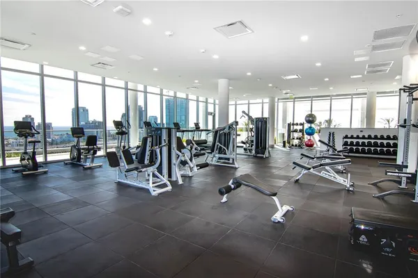 a living room with patio furniture