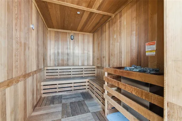 a view of a swimming pool with outdoor seating