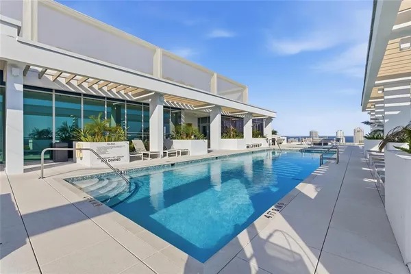 a kitchen with a cabinets and appliances