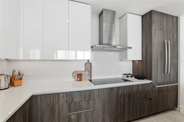 a kitchen with a sink and cabinets