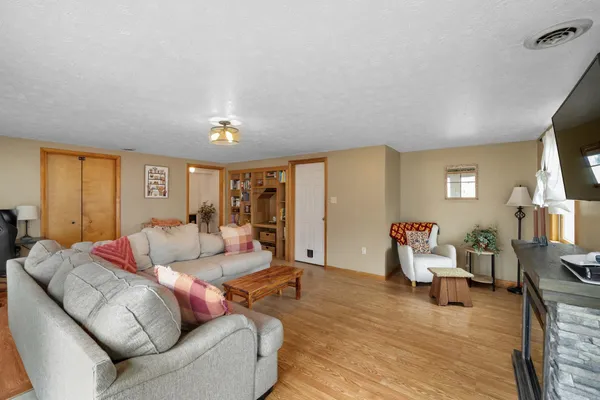 a view of a workspace with bookshelf
