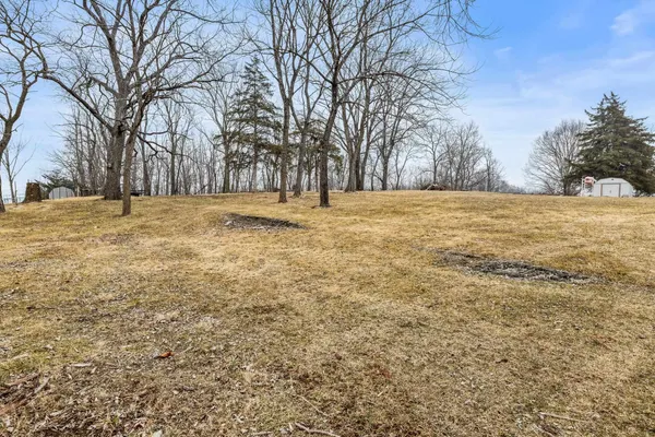 a house view with a backyard space