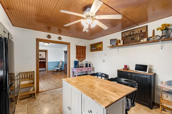a room with furniture and air hockey table