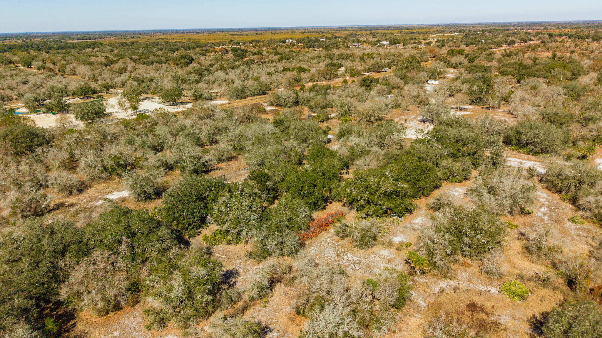 21486 Northwest 262nd Street Okeechobee, FL 34972 - Photo 13 of 22 a view of a field with an outdoor space