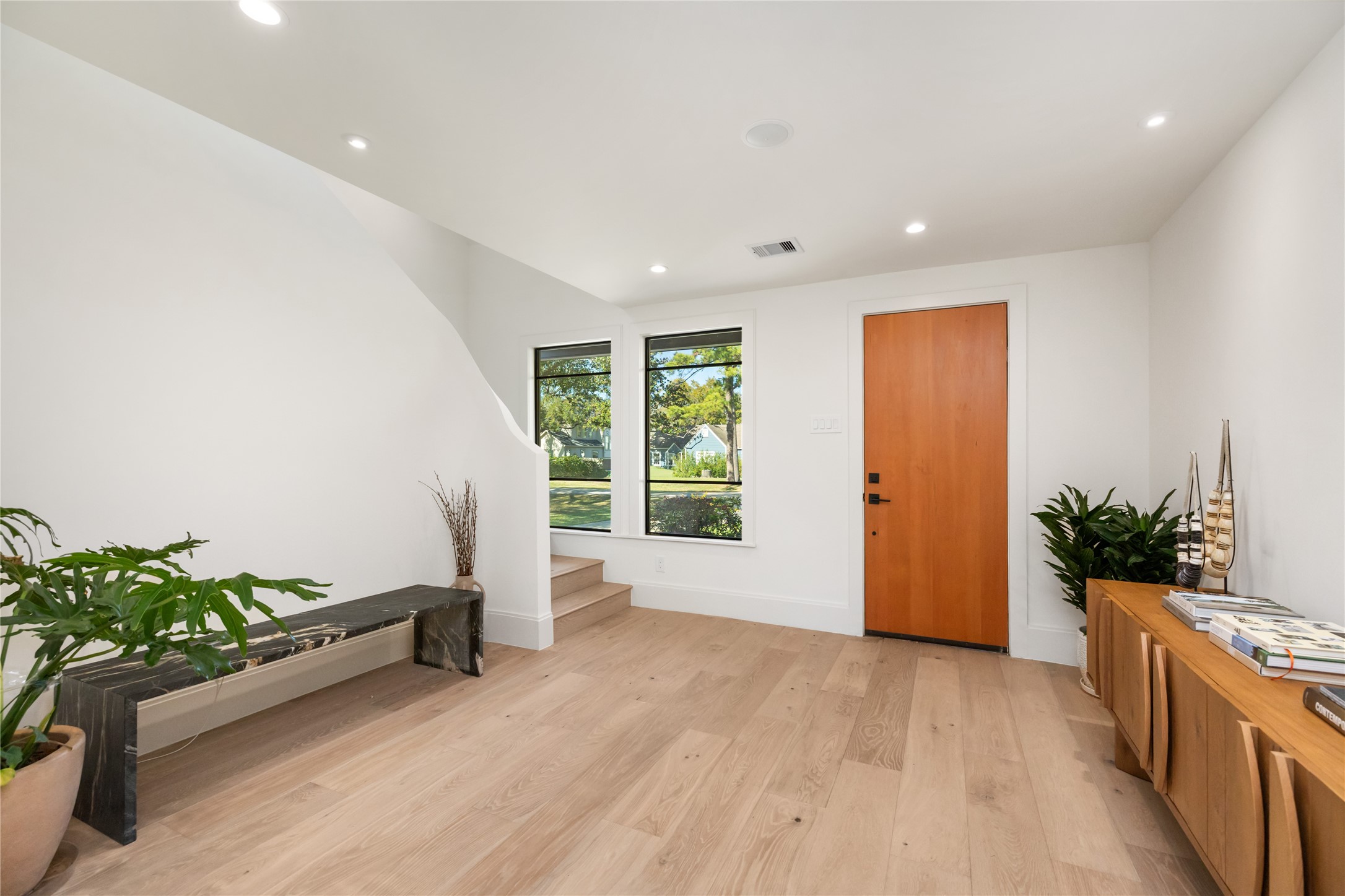 419 West 30th Street Houston, TX 77018 - Photo 6 of 45 a view of an empty room with a window and wooden floor