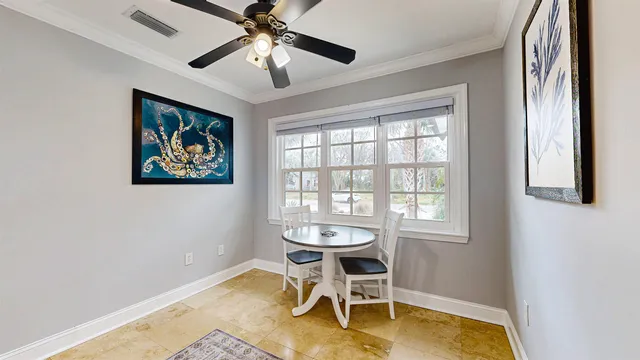a view of hallway with stairs and wooden floor