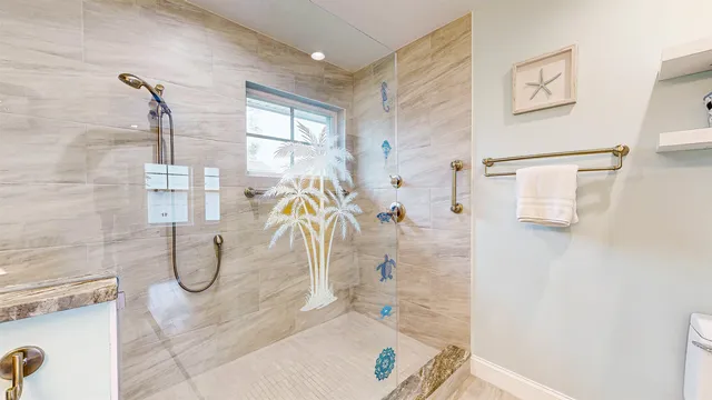 a living room with furniture and a book shelf
